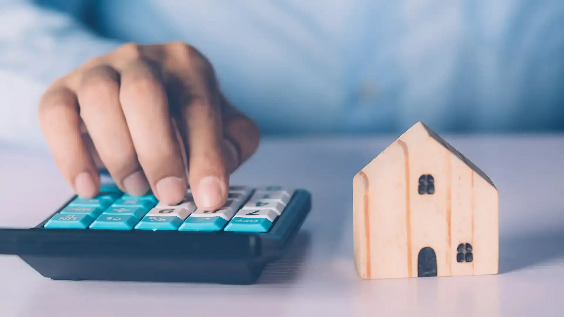 Man calculating his equity for his home