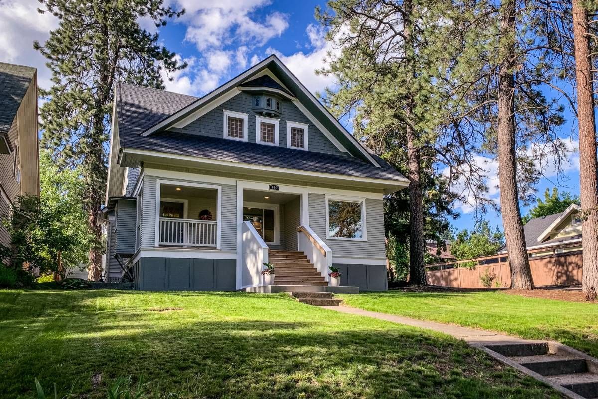 Craftsman style home surrounded by trees near Lexington, K