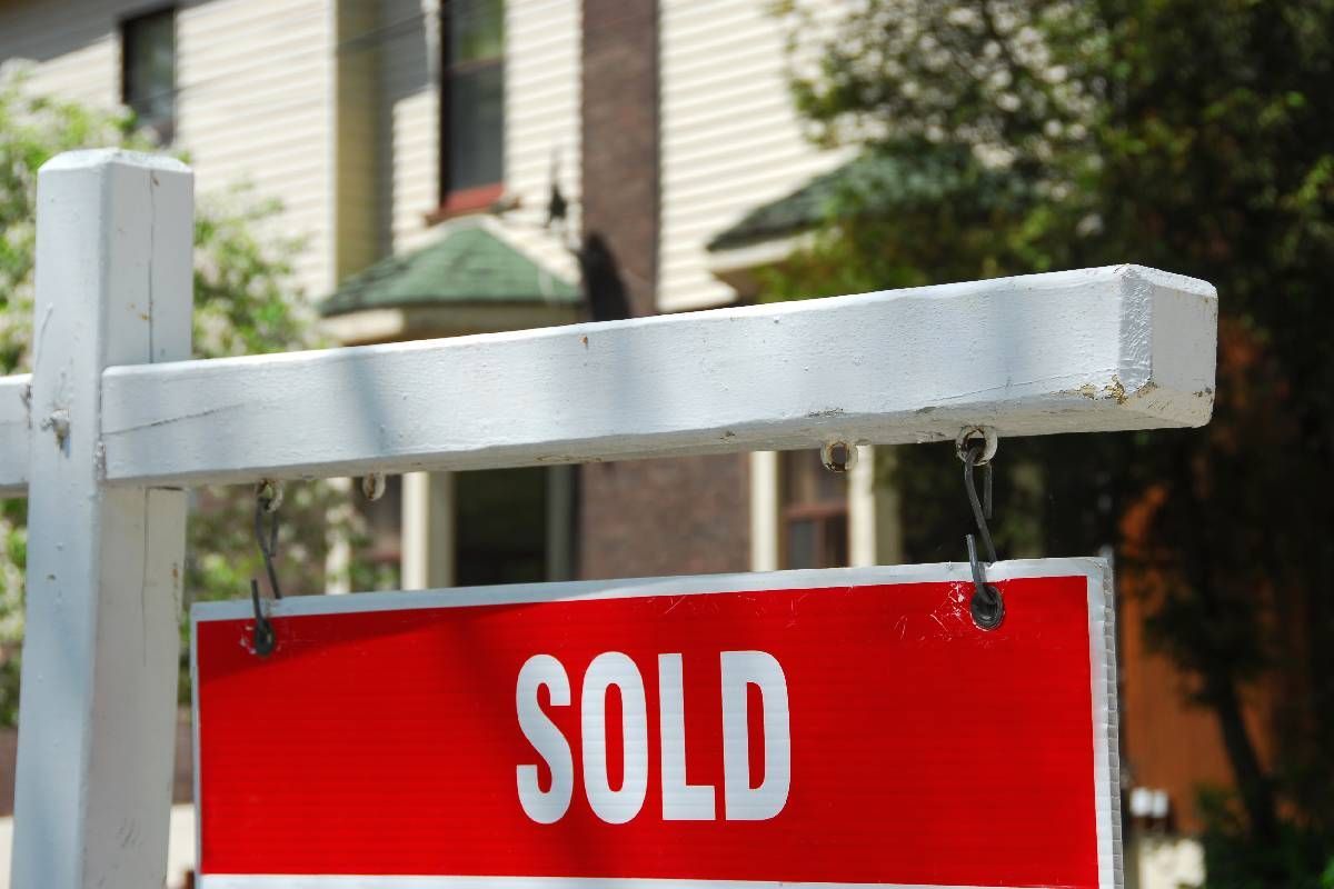 A sold sign in front of a home near Lexington, Kentucky (KY)
