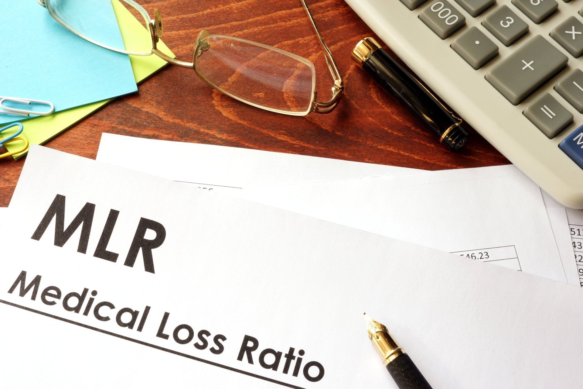 Medical Loss Ratio document and pen