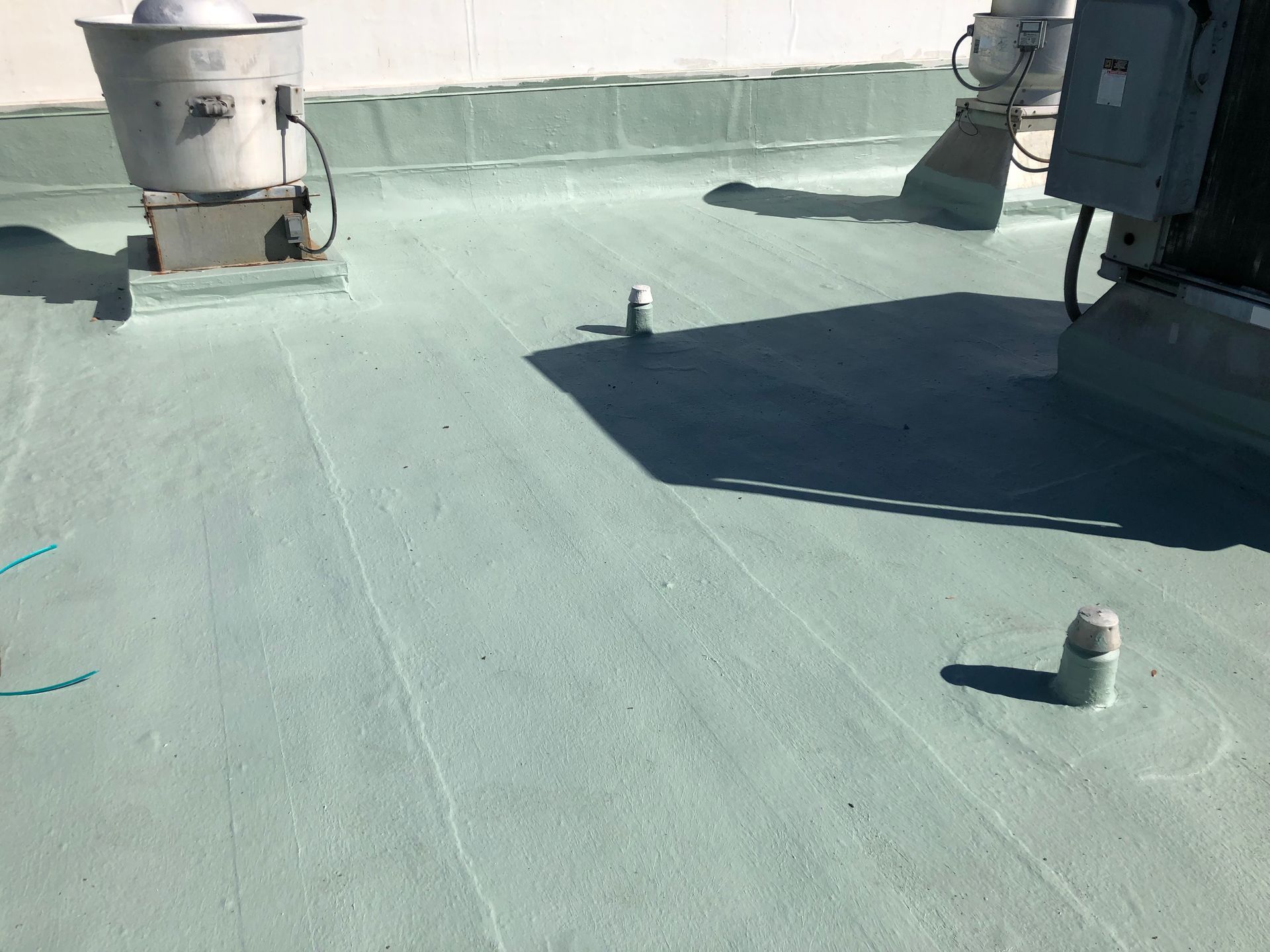 Commercial roof being prepared and detailed before coating in Auburndale, Florida