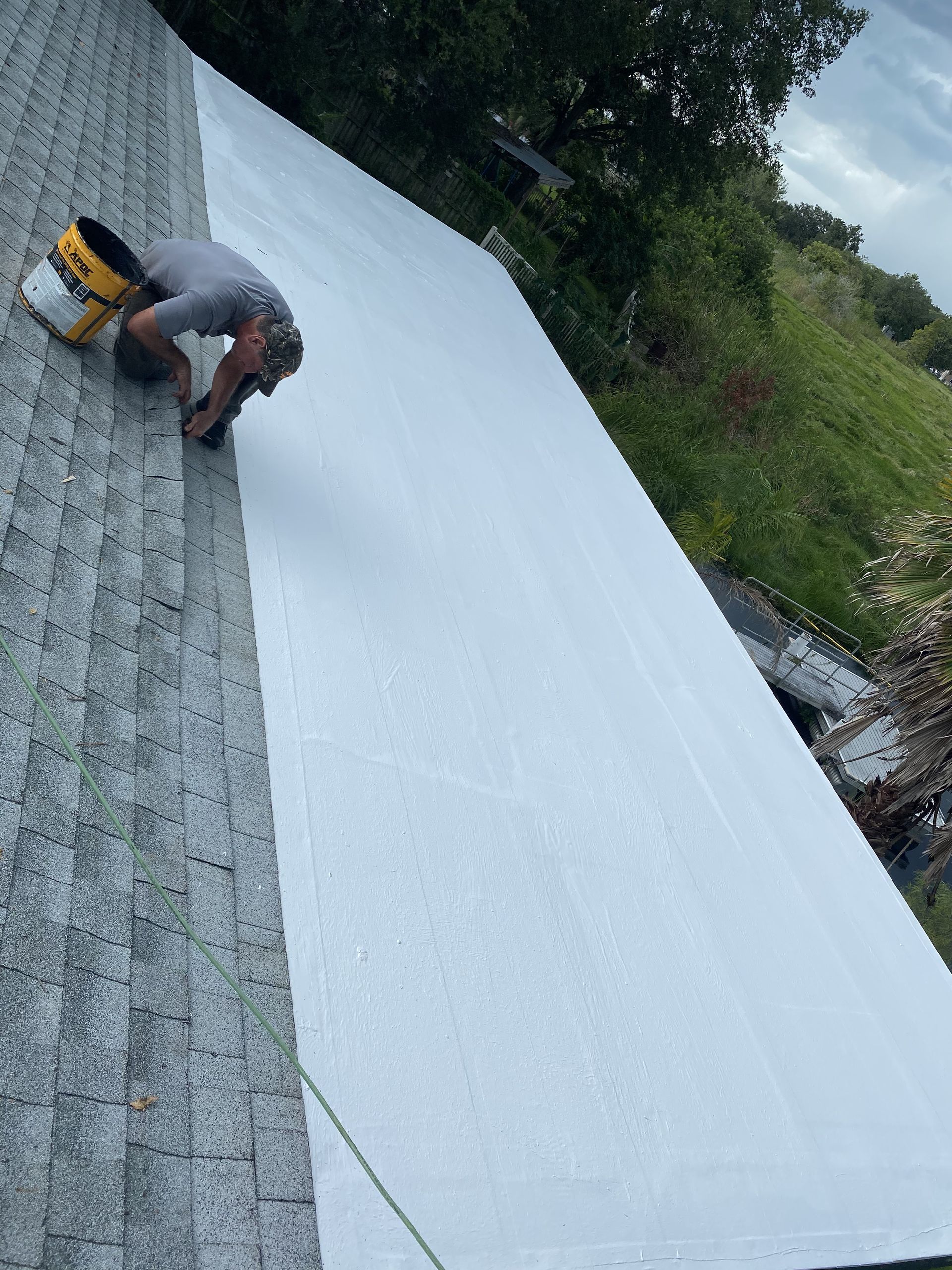 Cleaned roof drainage area after maintenance on an Auburndale, Florida property