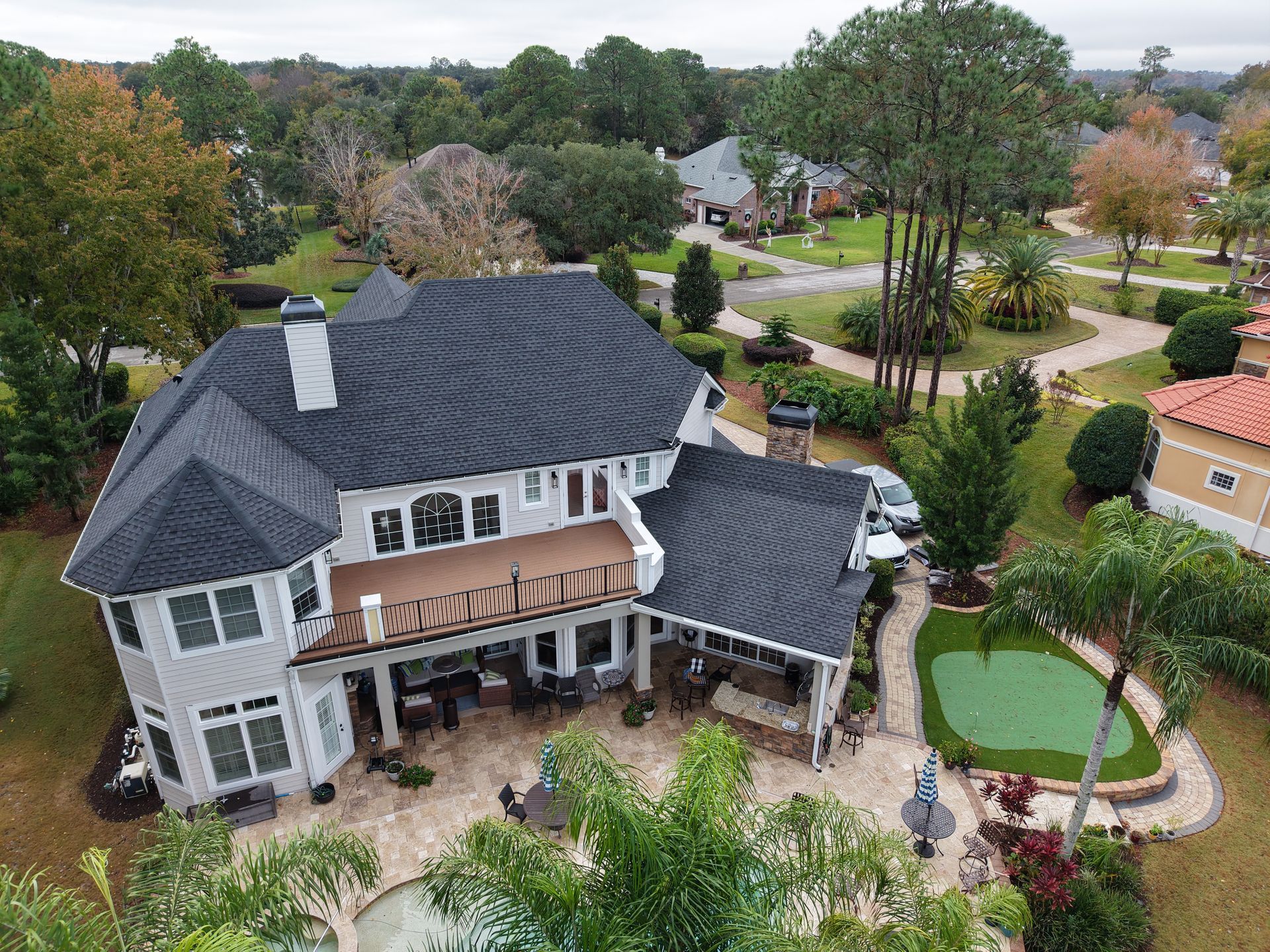 Completed architectural asphalt shingle roof on a home in Auburndale, Florida