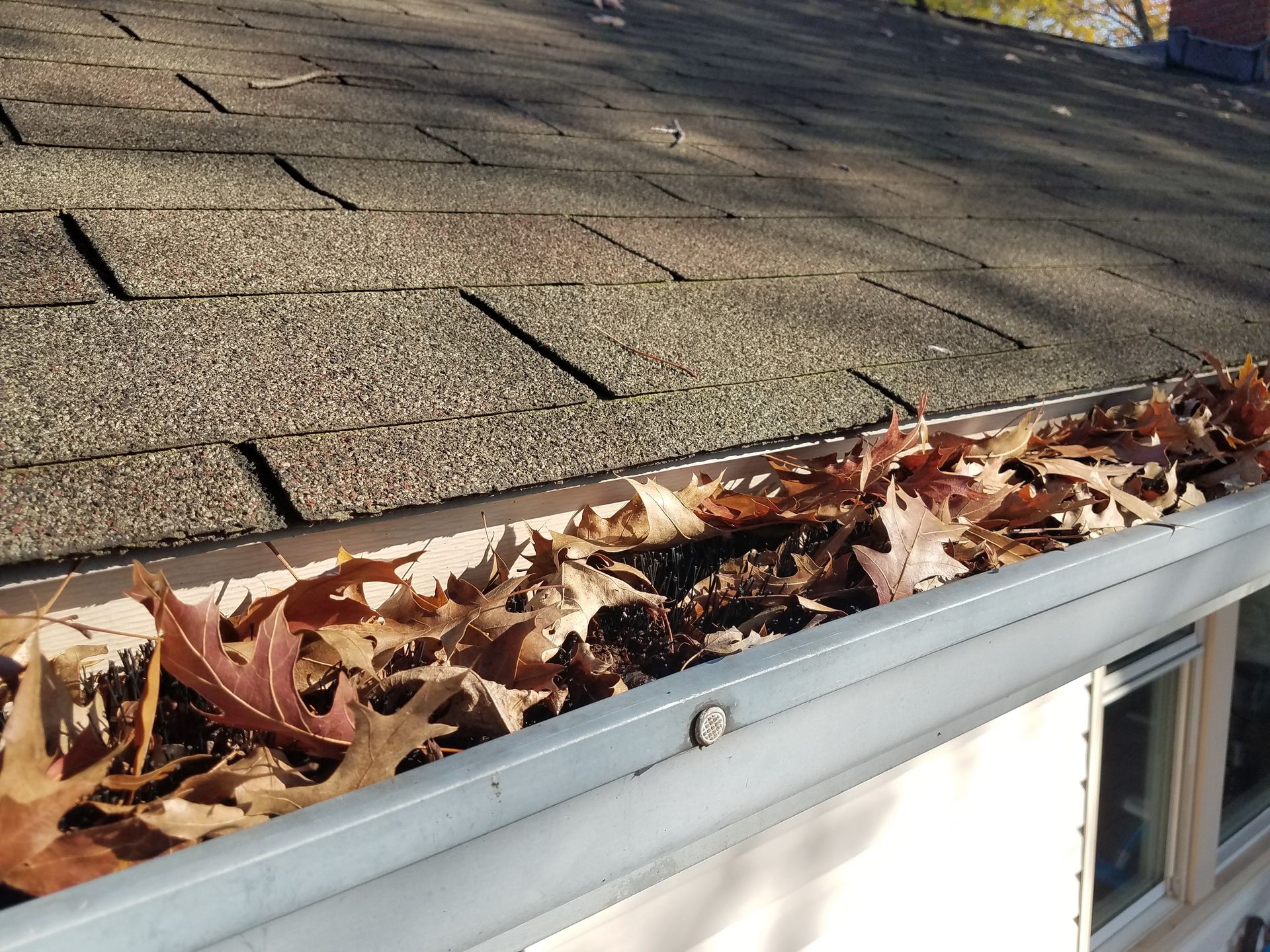 Completed gutter protection system on an Auburndale home