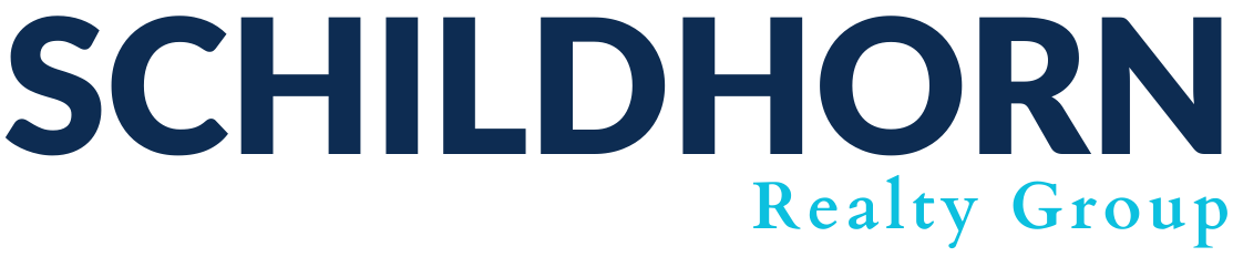 Schildhorn Realty Group logo in blue and teal text on a white background