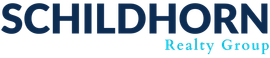 Schildhorn Realty Group logo in blue and teal text on a white background
