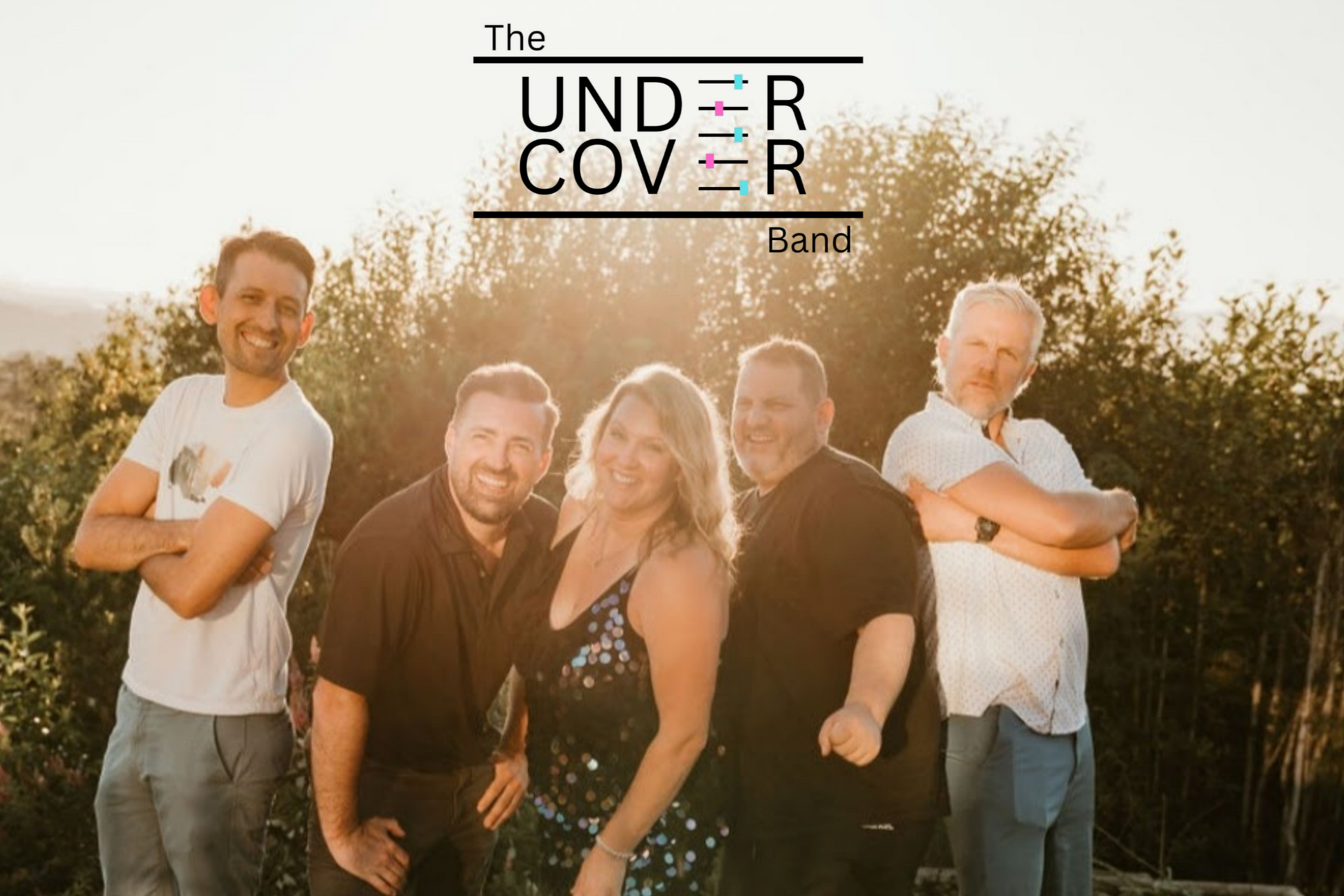 Five people standing outdoors in warm sunlight, with “The UNDER COVER Band” text above them.