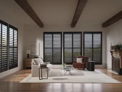 Modern kitchen with wood cabinets, island sink, bench seating, and wide striped window shades