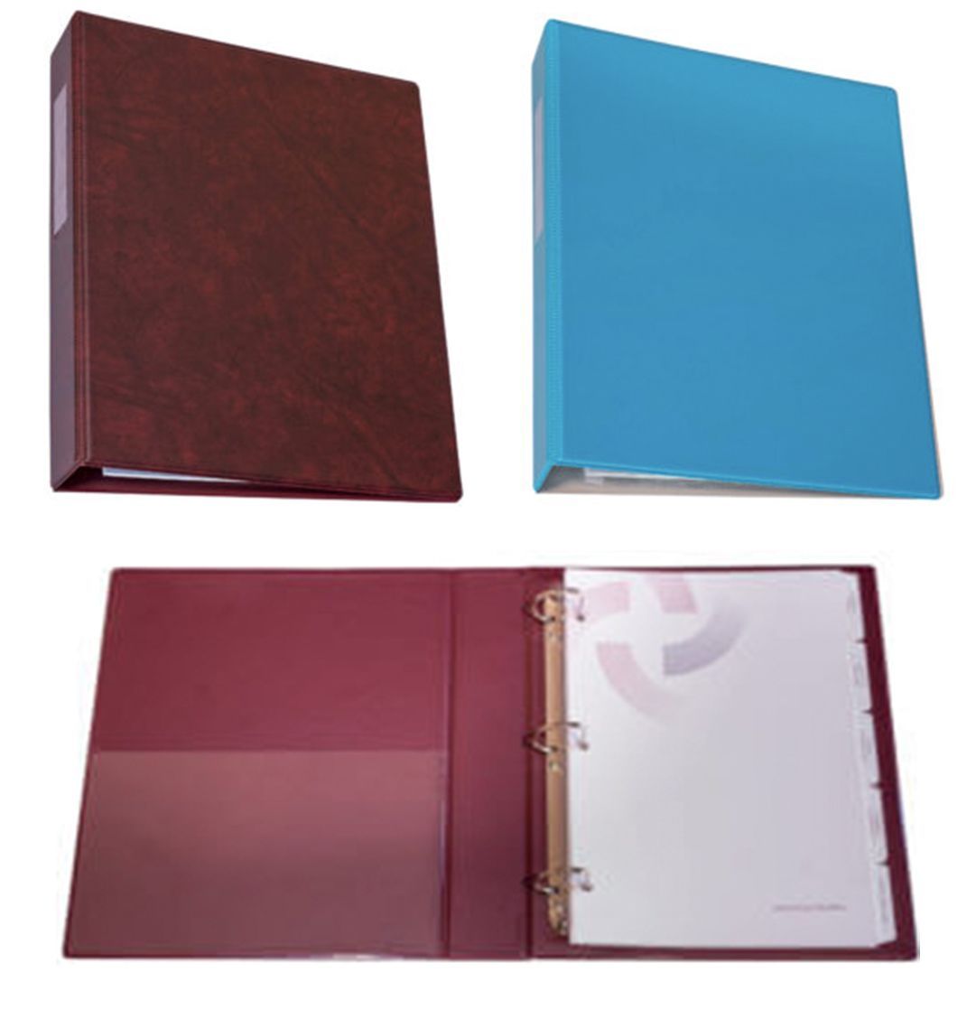 Maroon and blue three-ring binders, with the maroon binder open showing clear sleeves inside.
