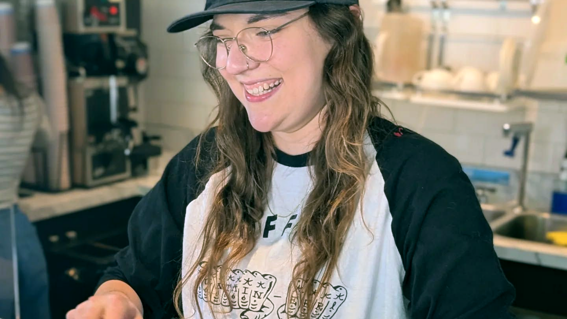 Barista Morgan serves up a bit of sunshine with your cappuccino at Mountaineer Coffee