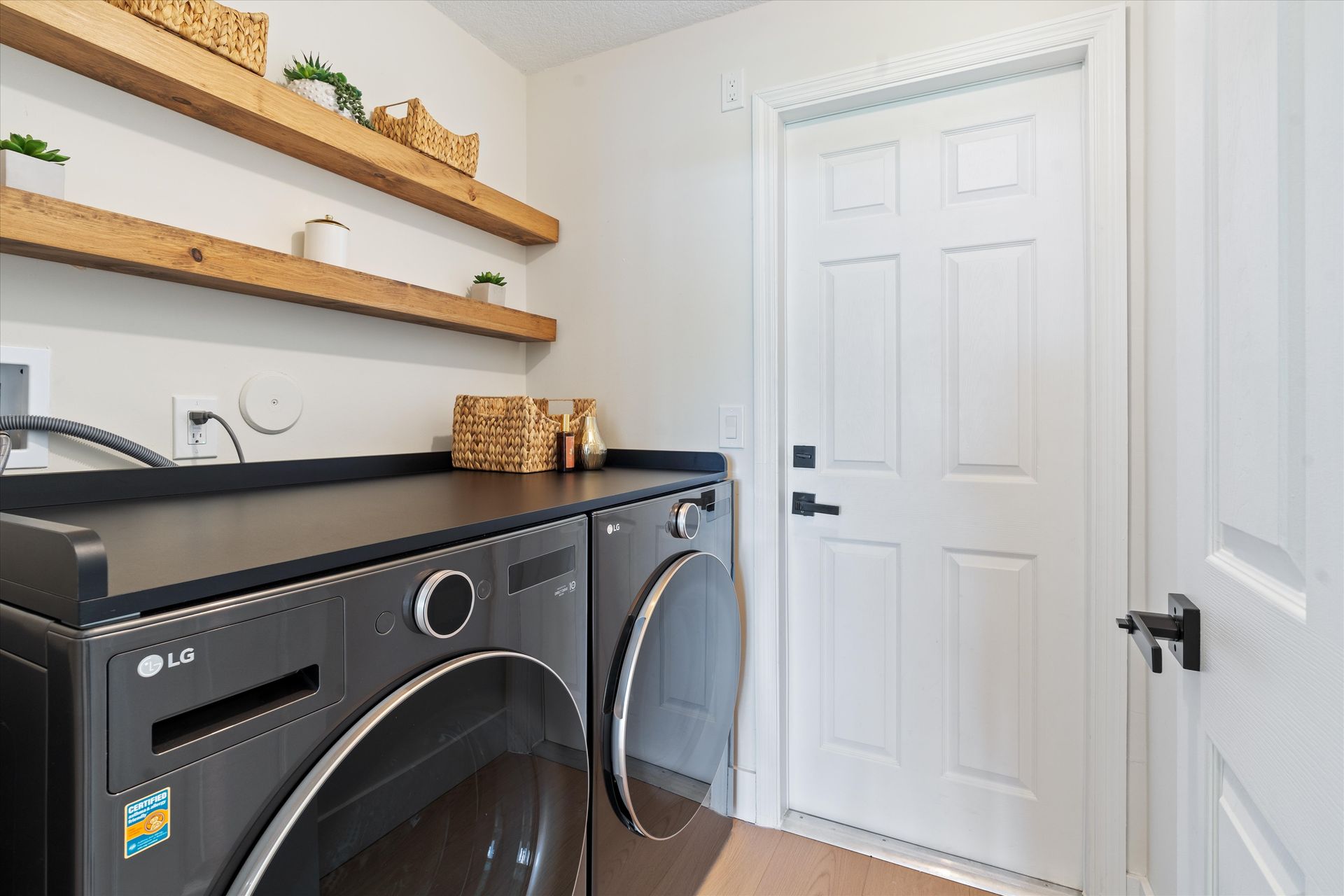 There is a washer and dryer in the laundry room.