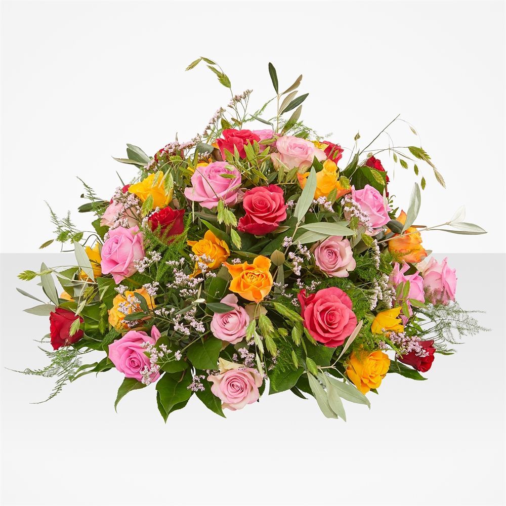 Kleurrijk rond rouwstuk Bloemenkus van Avablooms