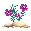 a bunch of purple flowers growing out of a pile of rocks .