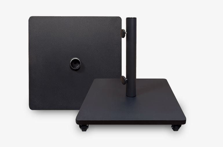A black umbrella stand is sitting on a white surface