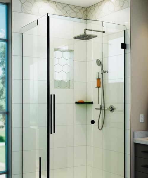 A shower with a glass door and a shower head