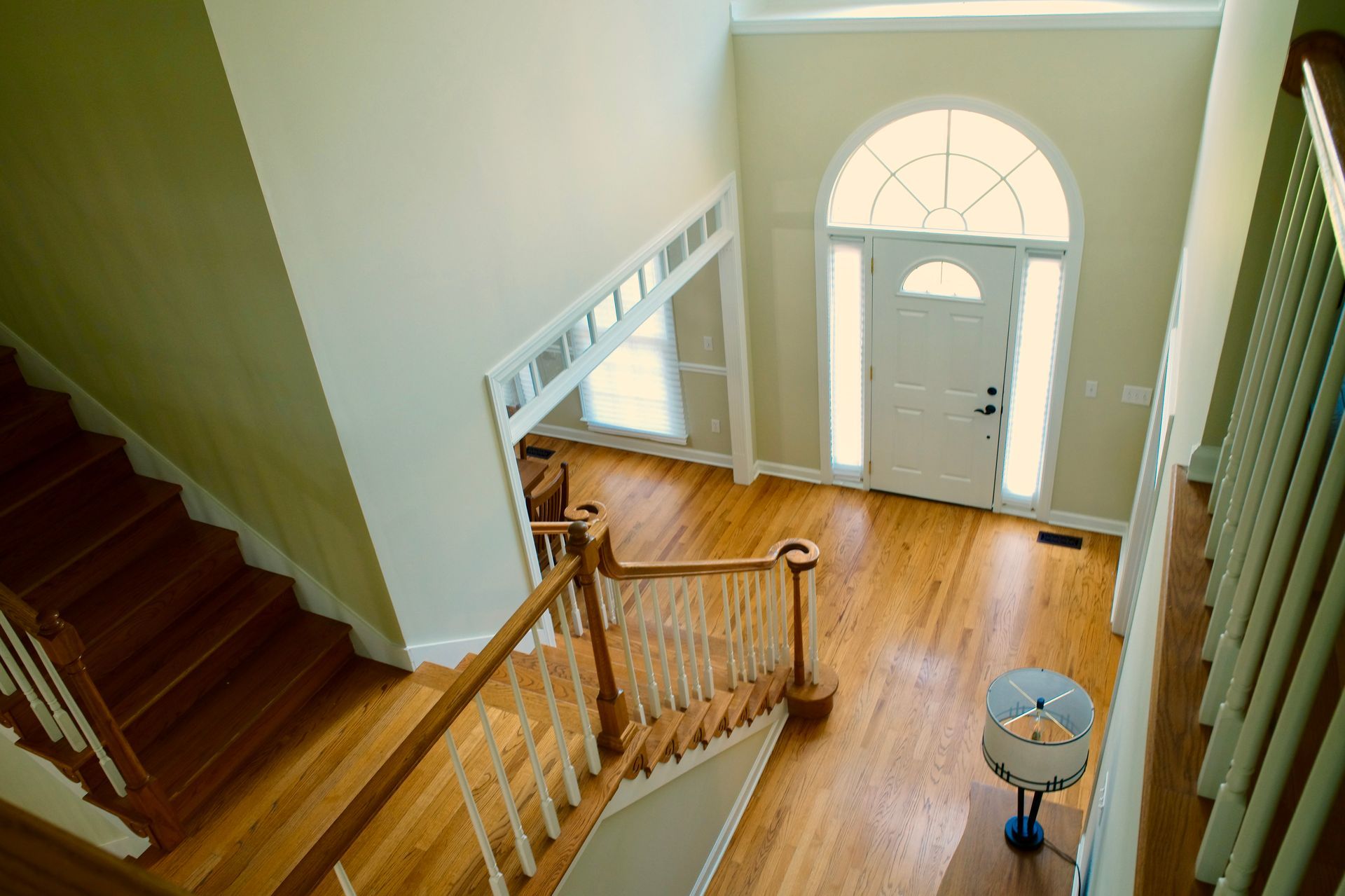 An aerial view of a house with stairs and a door