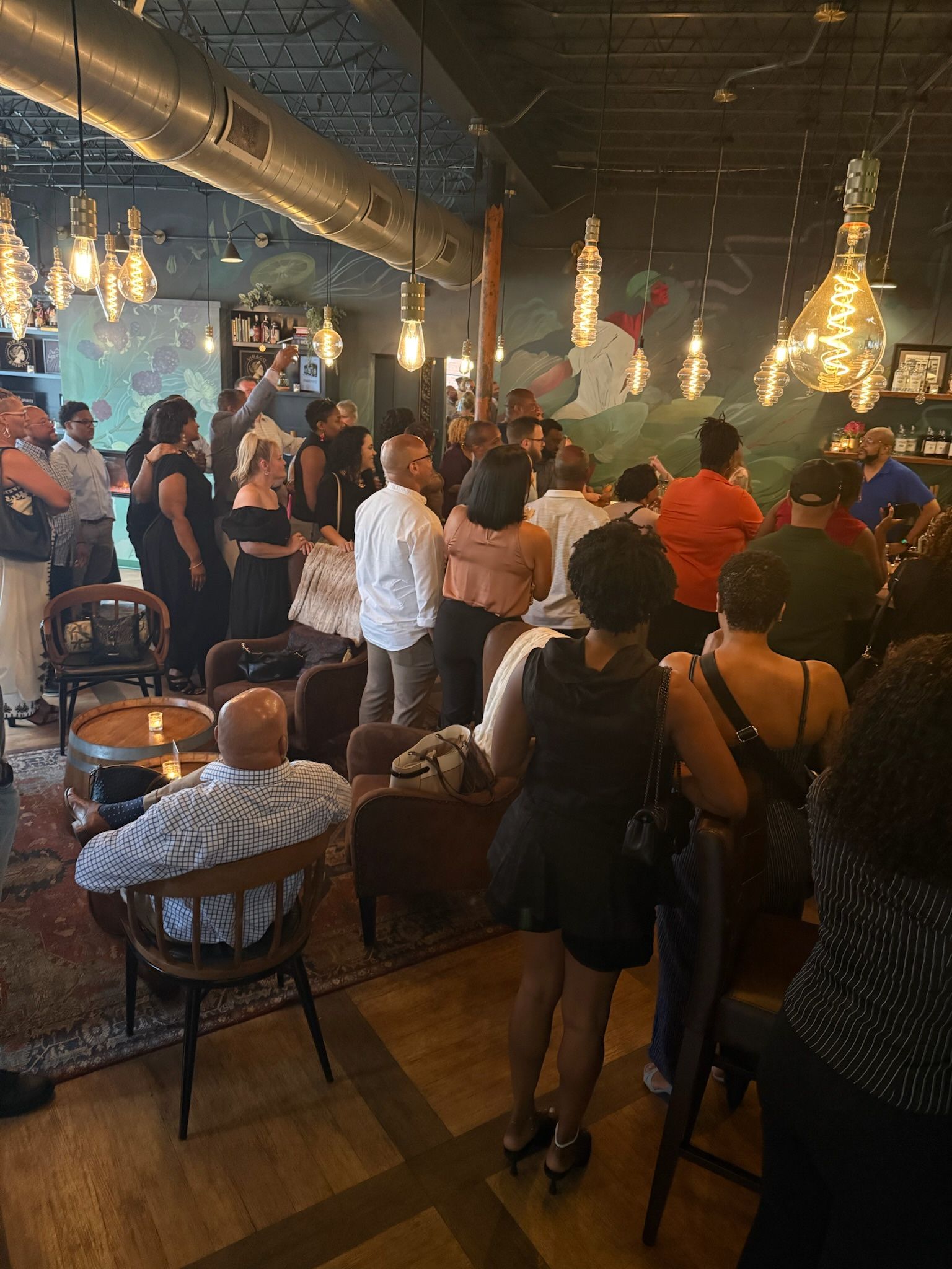 Friends and guests gathered in a lively dining room