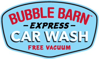 Bubble Barn Express Car Wash logo with red and white text on a blue background; offers free vacuum.