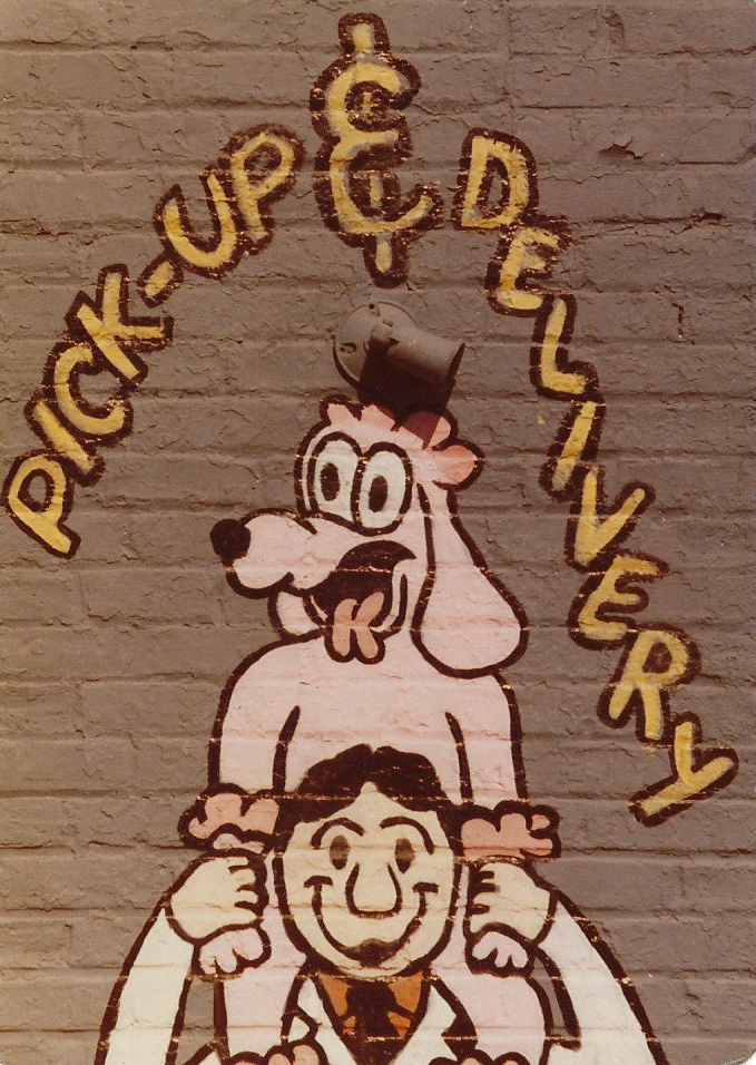 A cartoon drawing of a man and a dog with the words pick-up & delivery written around them