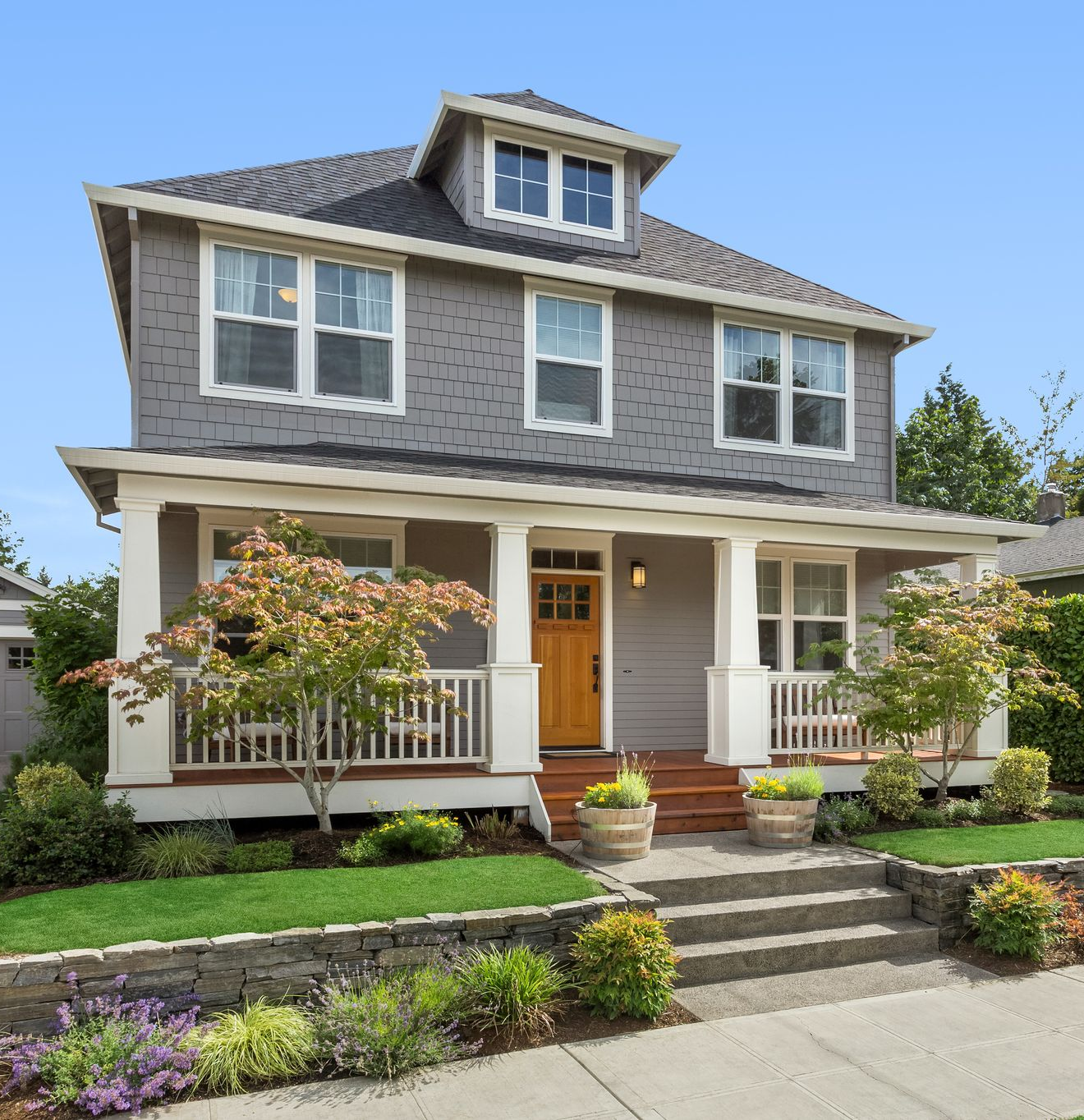 Residential yard with fresh landscaping and garden work. Residential yard with fresh landscaping and garden work.