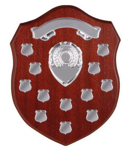 A Wooden Shield Adorned With a Silver Plaque — Trophies in Townsville