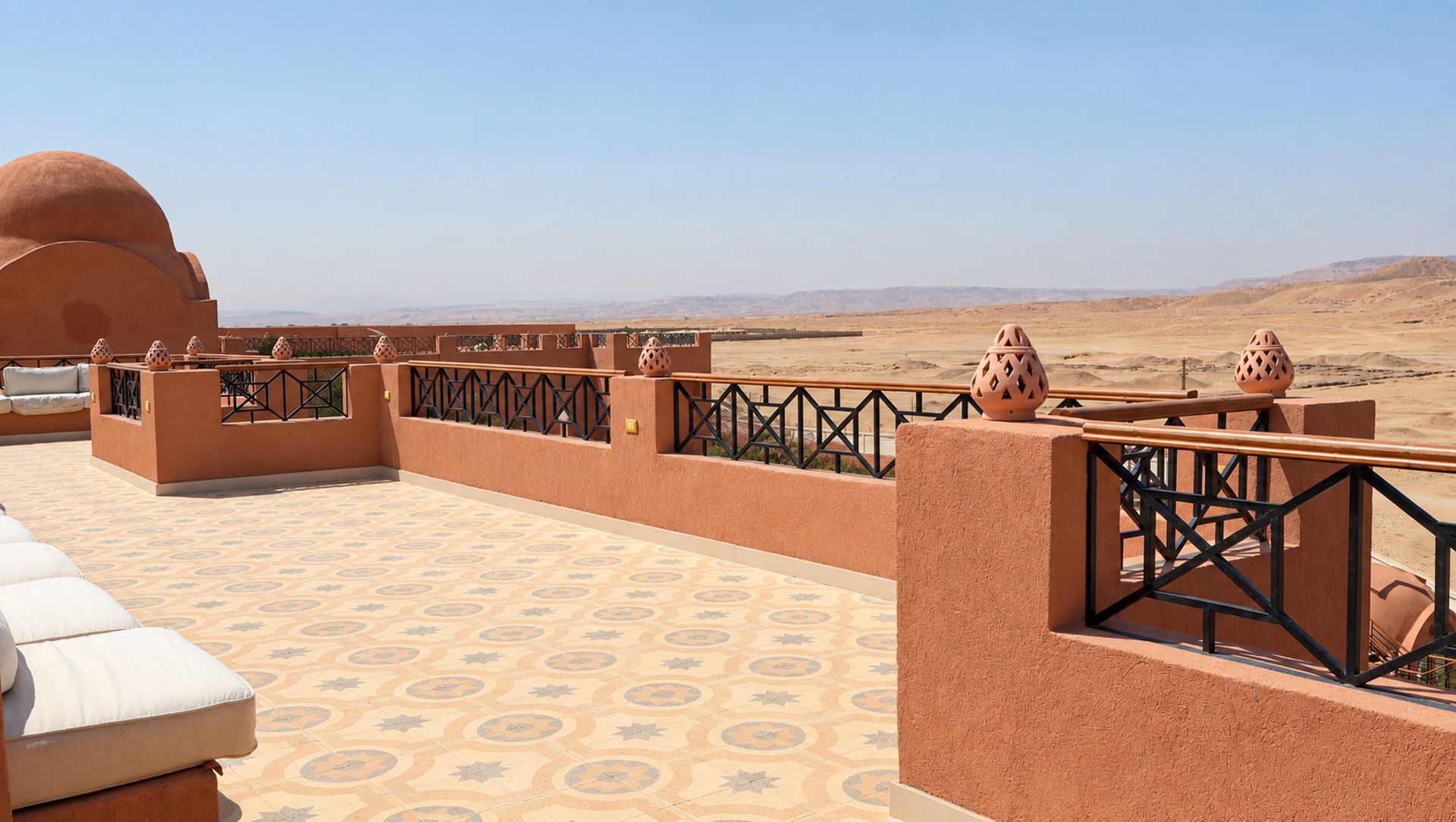 Roof terrace at Malkata House- hot air balloons at sunrise