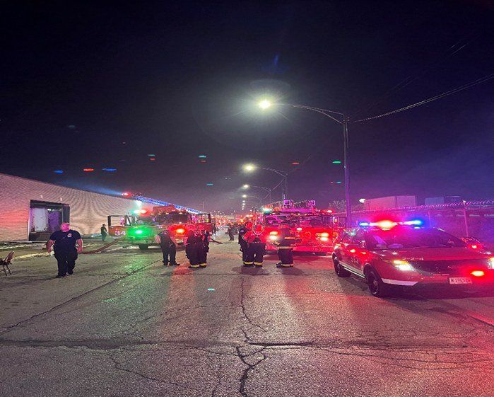 Police Officers and Firefighters in the Road — Chicago, IL — Mid America Paper Recycling Co Inc Police Officers and Firefighters in the Road — Chicago, IL — Mid America Paper Recycling Co Inc