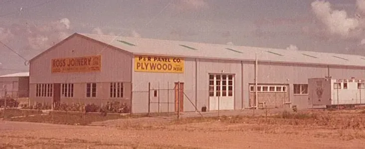 A Large Building With a Yellow Sign That Says Plywood on It — Ross Joinery Kitchens In Garbutt, QLD