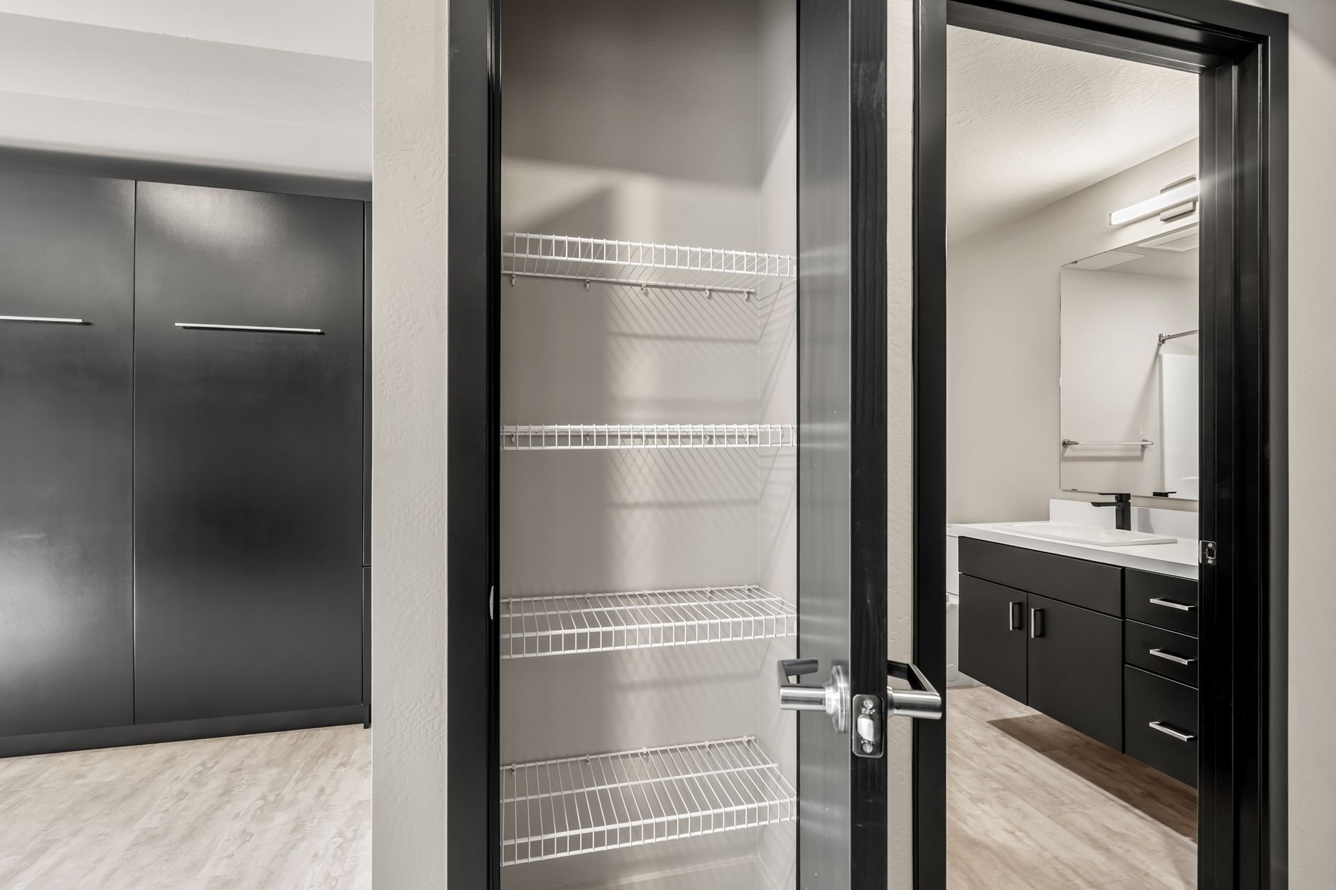 Photo of a linen closet in the hallway of an apartment building