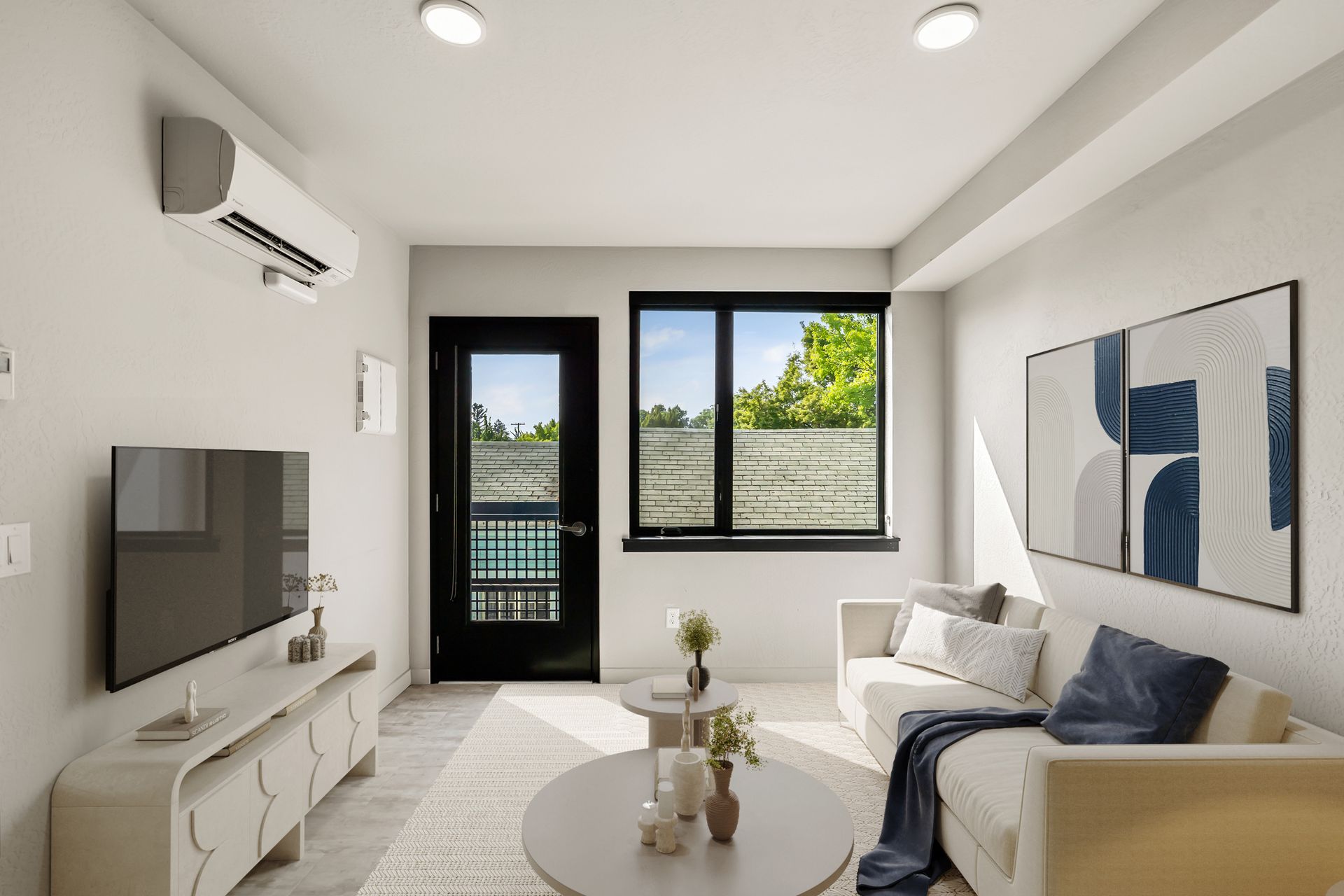Photo of a living room with a door that has a glass window