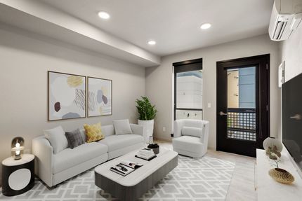 Photo of a living room with plenty of natural and artificial lighting