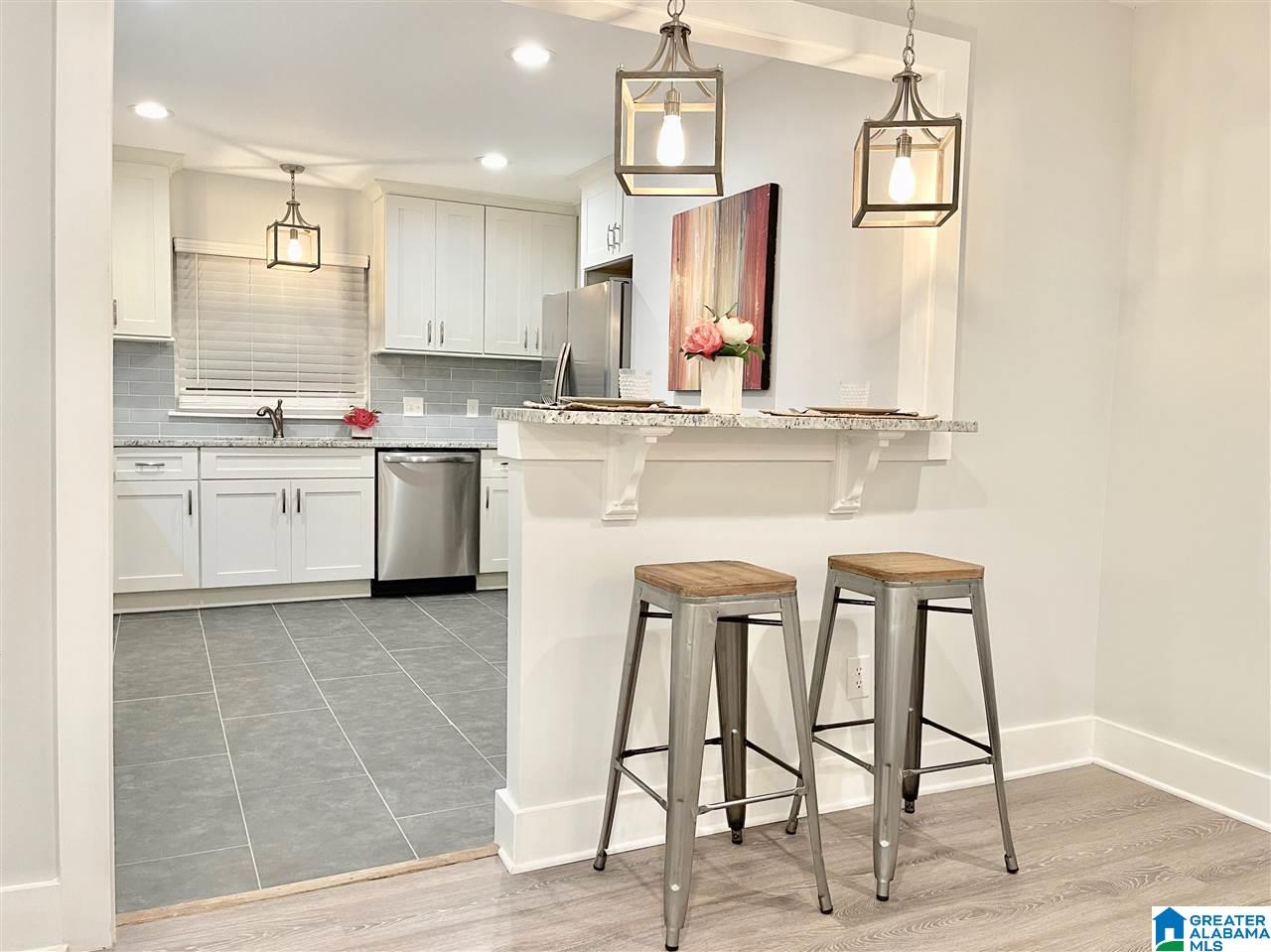 kitchen with bar stools after KCG