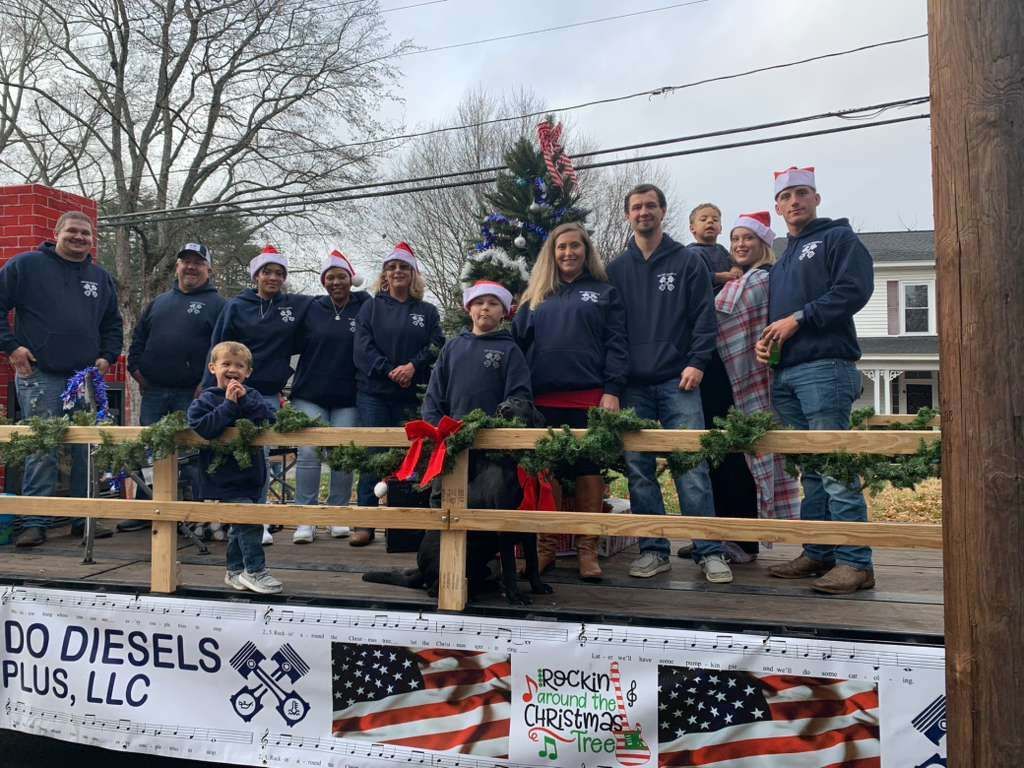 Group on float with Christmas decorations; 