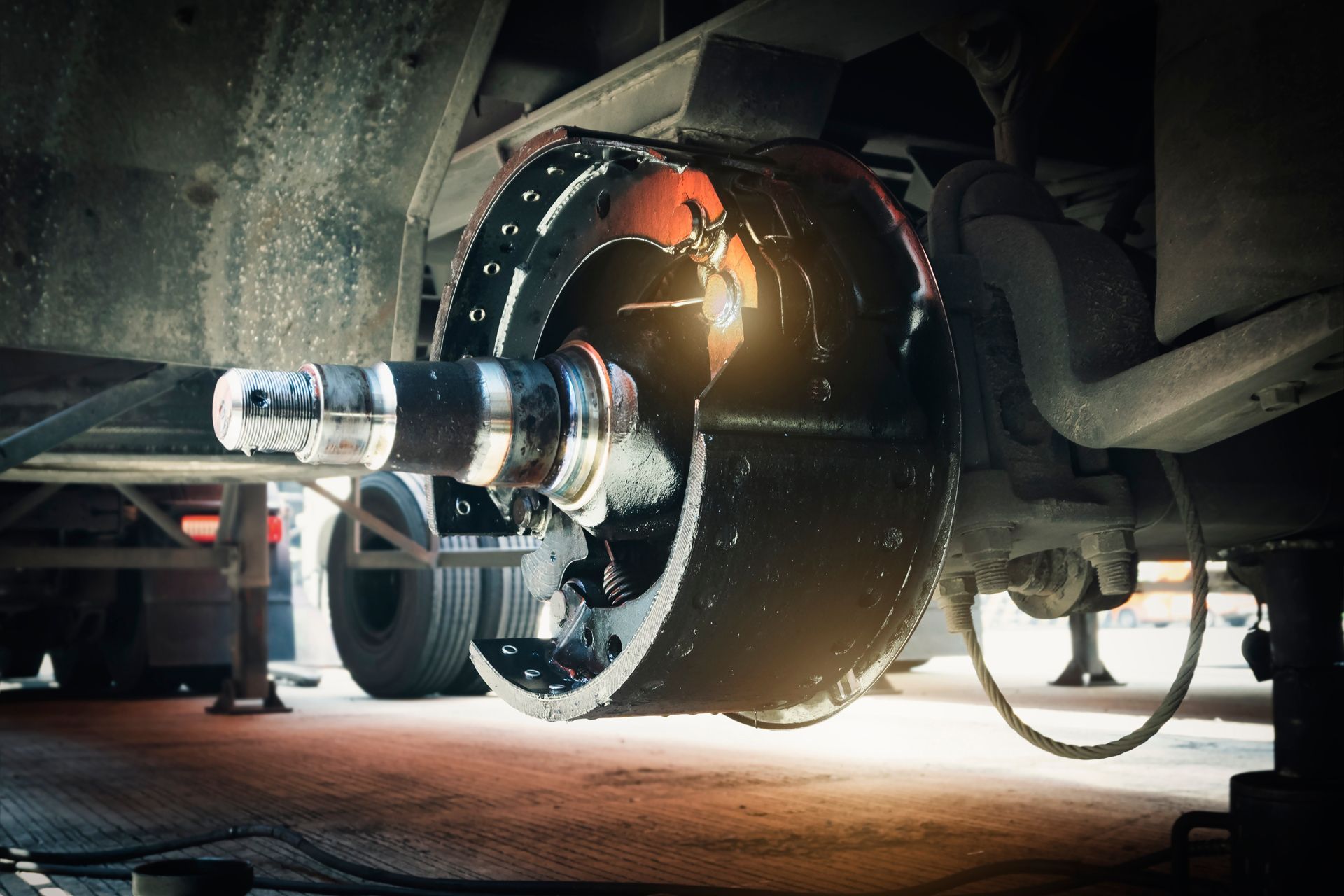 Truck axle and brake components, close-up. 