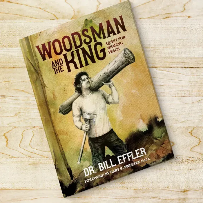 Book cover: Man carrying log, title