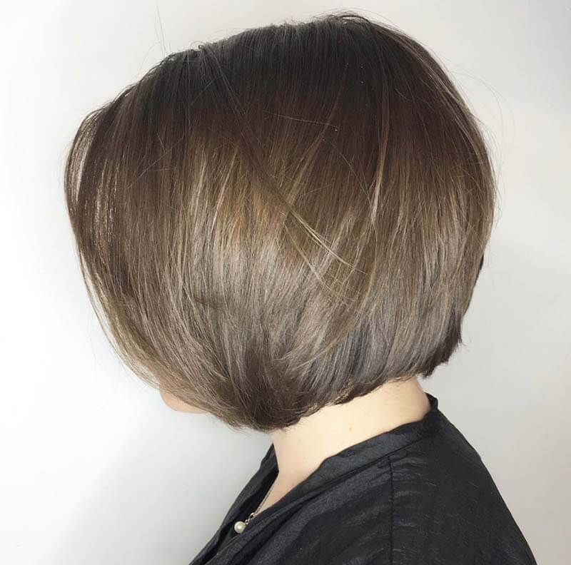 Short brown bob haircut with stacked layers