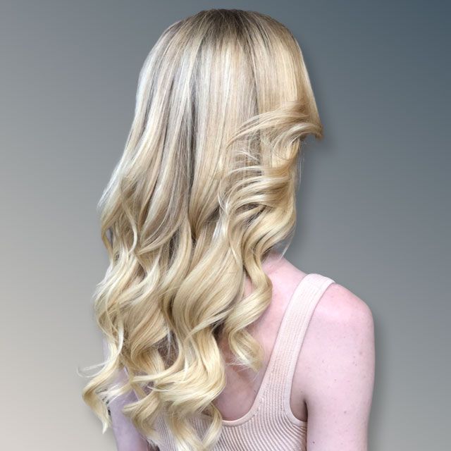 Blonde wavy hair viewed from the back