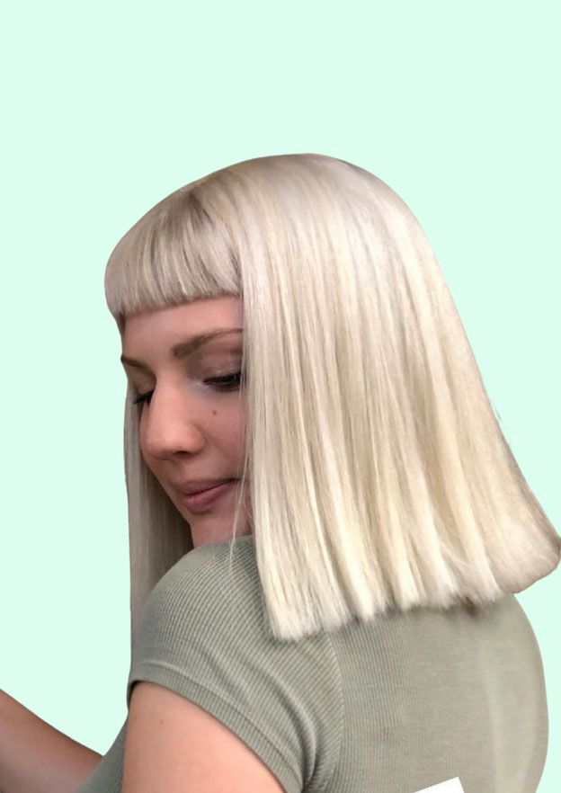 Blonde bob haircut with blunt bangs