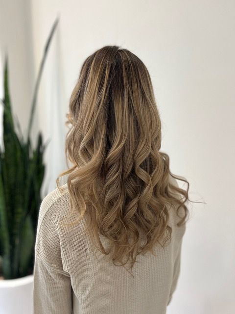 Back view of long, wavy blonde hair