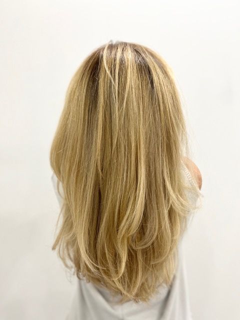 Blonde shoulder-length hair