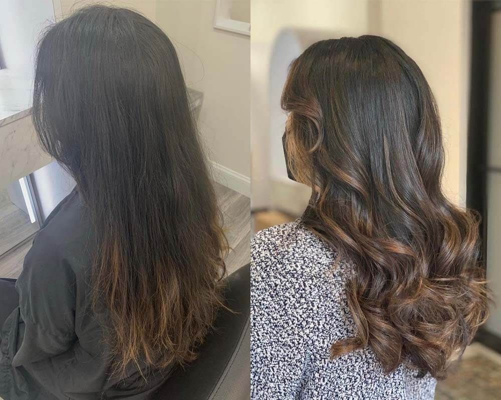 Before-and-after view of long dark hair, showing straight back view and curled side view in a salon setting