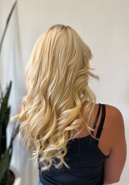 Blonde wavy hair viewed from behind
