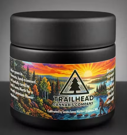 trailhead cannabis company jar with a river and a sun