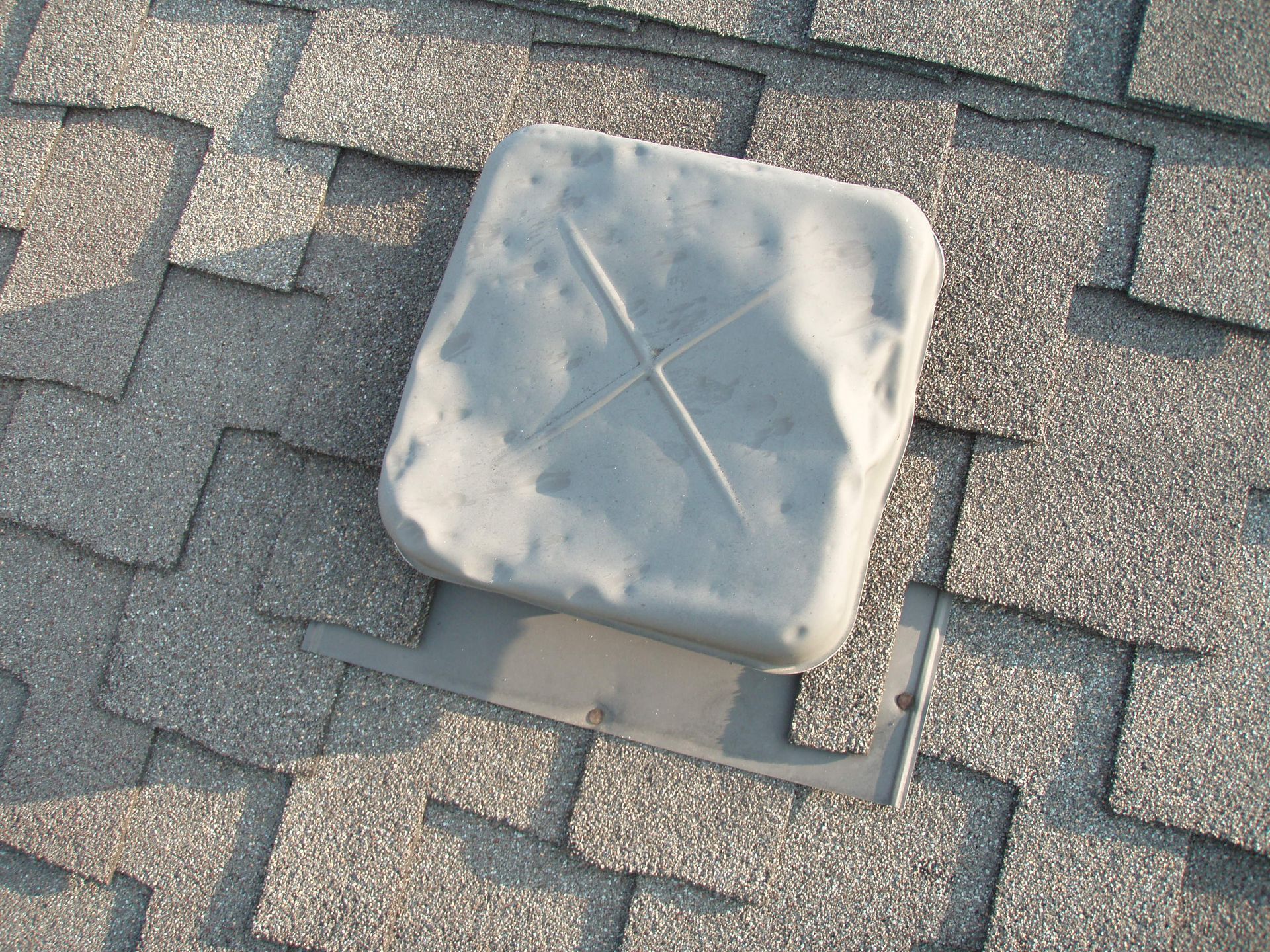 Hail damage on roof vent