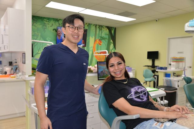 Dentist With Patient