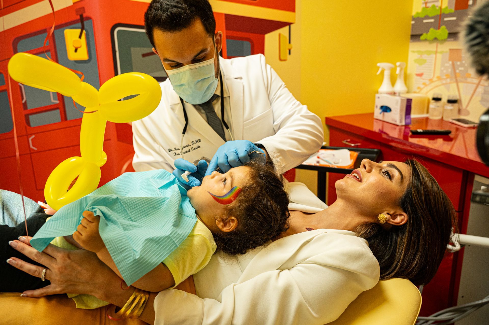 Parent and child receiving emergency pediatric dental care in Pomona CA