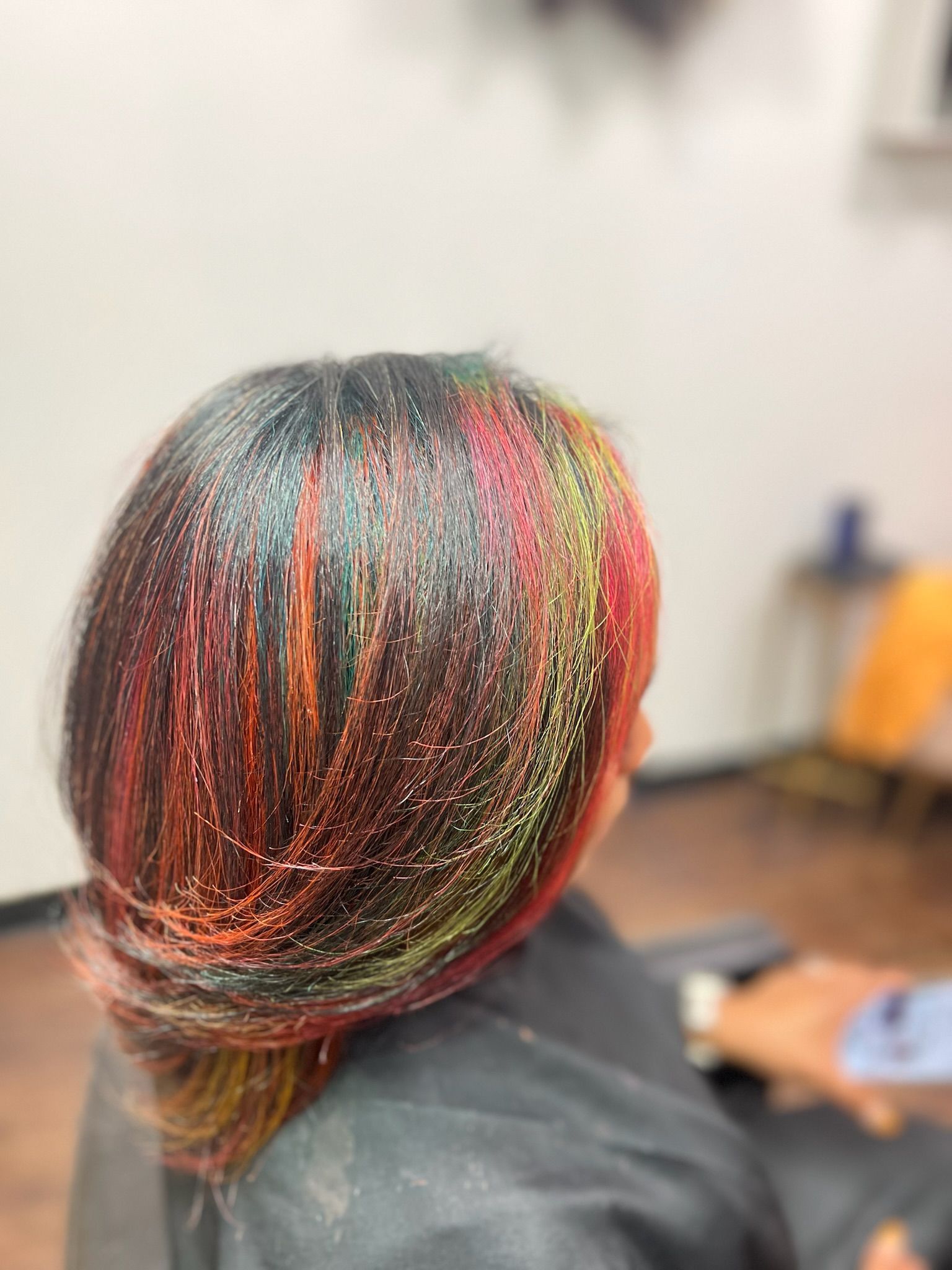 brown haired lady with red streaks in her hair