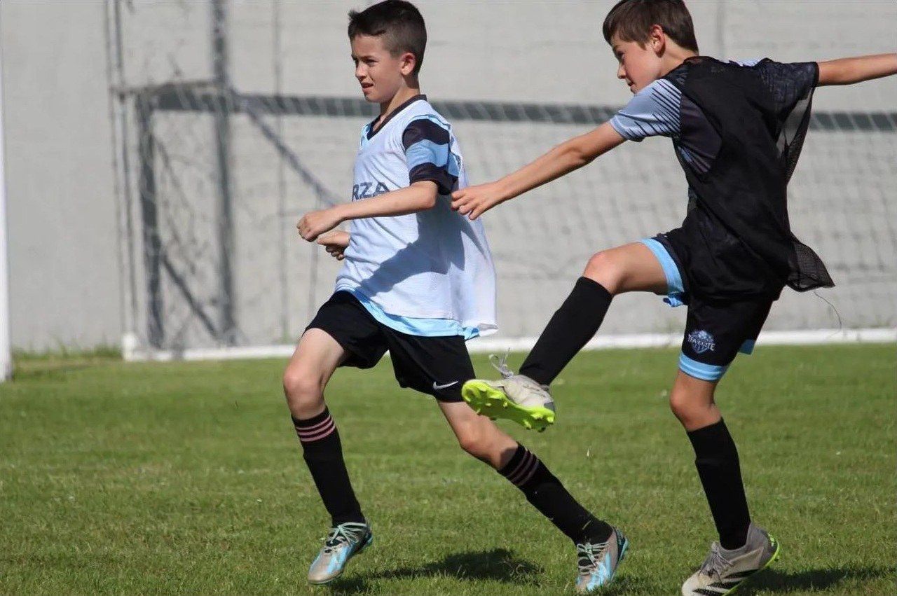Young players in a match at a previous Tempo football event