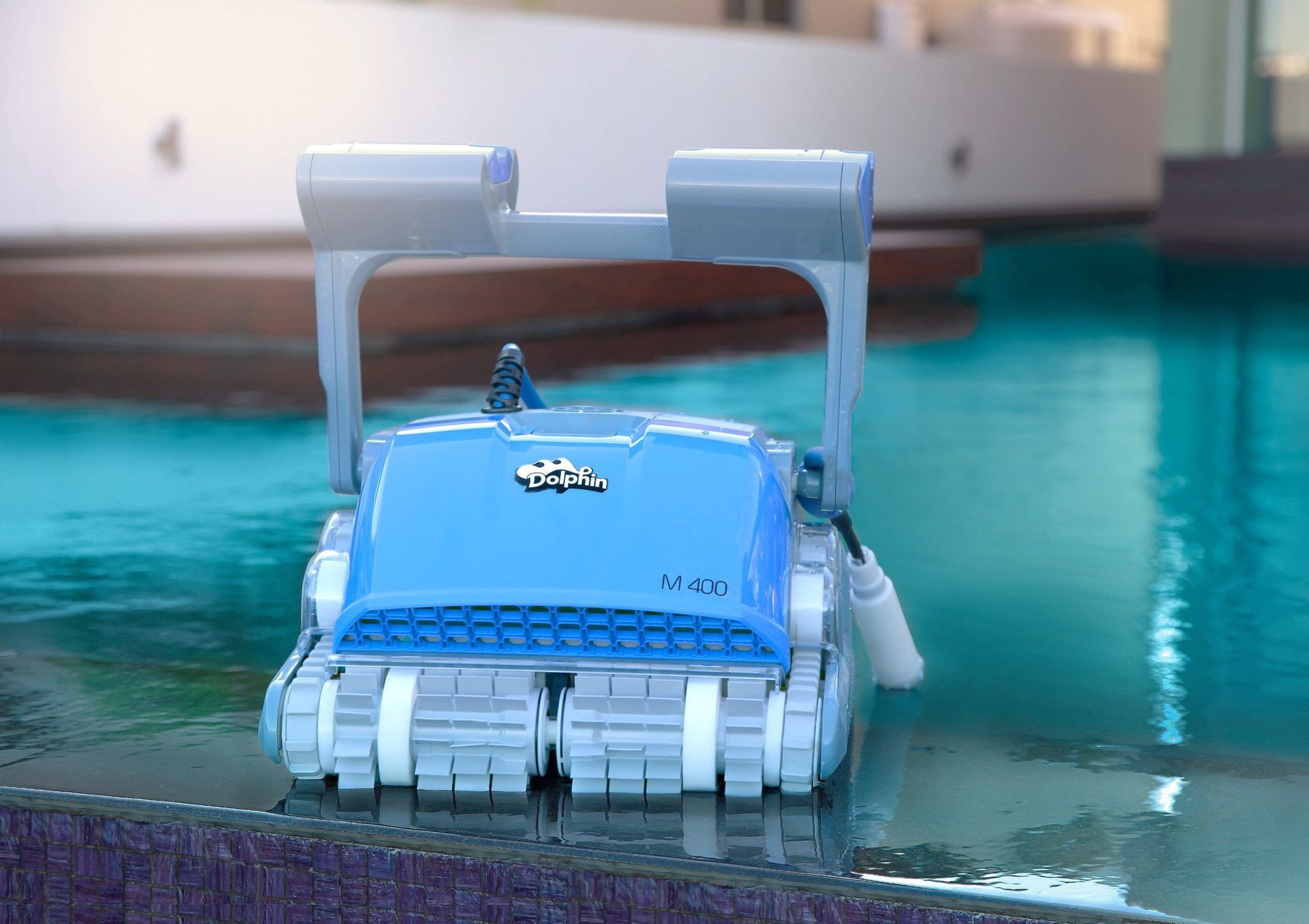 Blue Mechanical Device Floating in A Swimming Pool — Manning Pools, Rubber & Foam In Taree, NSW
