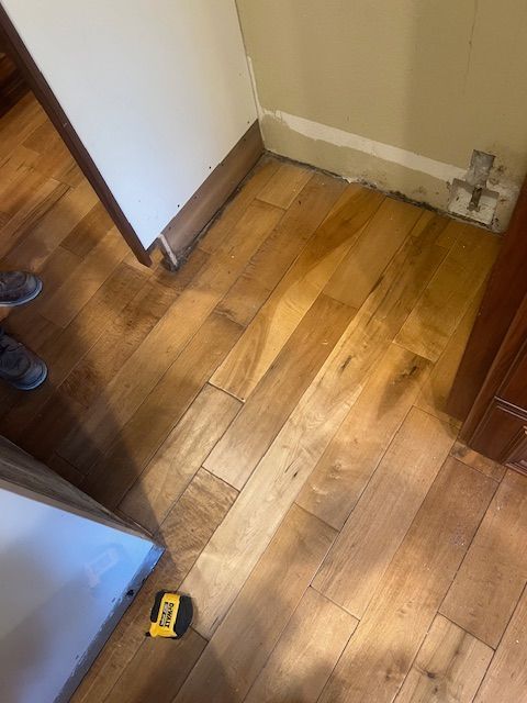 Professional repair of worn laminate flooring surfaces